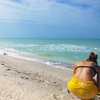 Sanibel Stoop is the position beachgoers always seem to be in