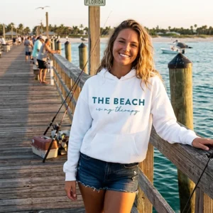 Beach hoodie worn by woman at a Florida fishing pier